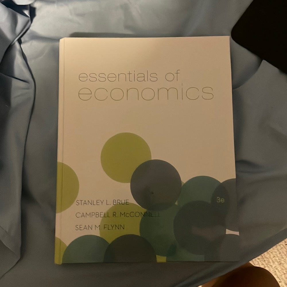 essentials of economics book
